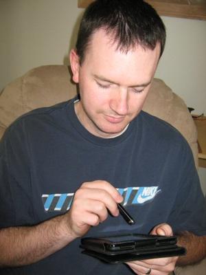 My husband playing on his Kindle Fire