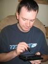 My husband playing on his Kindle Fire